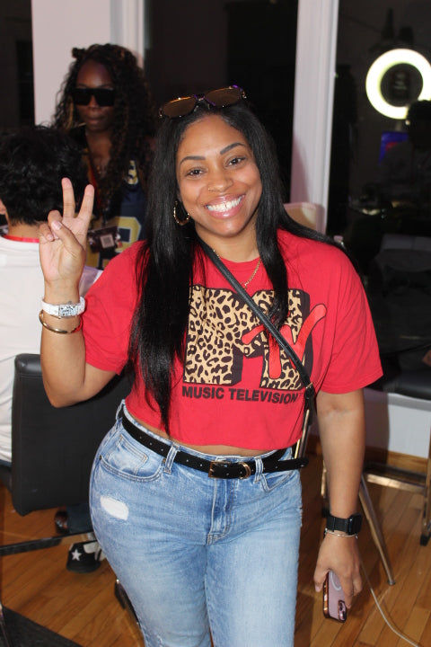 A smiling guest enjoying DMV Backyard Jam