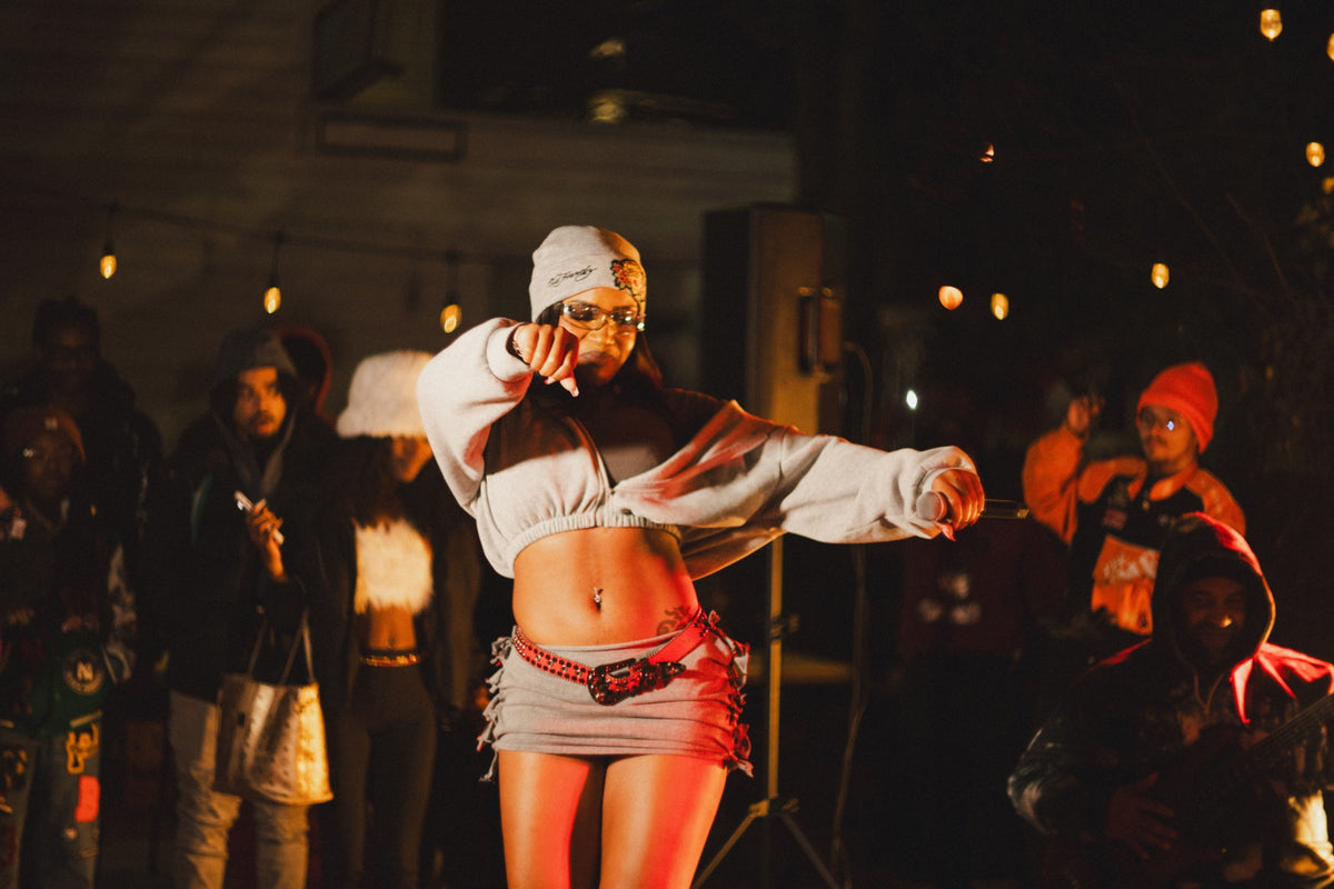 Artist performing among the crowd at DMV Backyard Jam