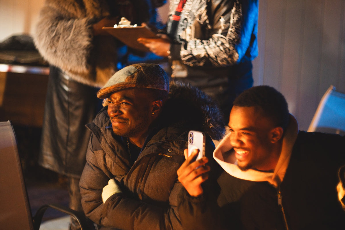 Two guests enjoying a performance at DMV Backyard Jam
